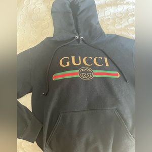Gucci style hoodie in black. Fits a Mens Medium.